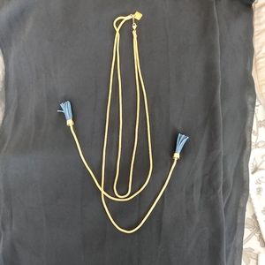 Unique leather and gold plated tie NECKLACE.